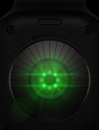 Back of Apple Watch Ultra 4, titanium case, black colour, multiple round sensors with glowing green LED lights